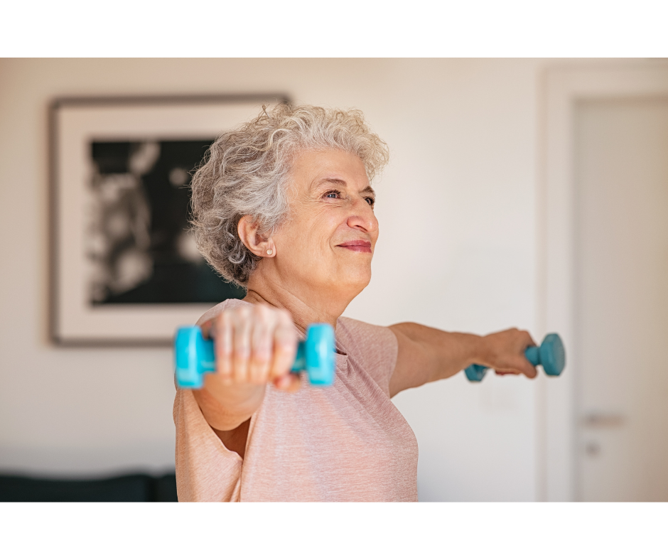 Senior woman lifts blue dumbbells